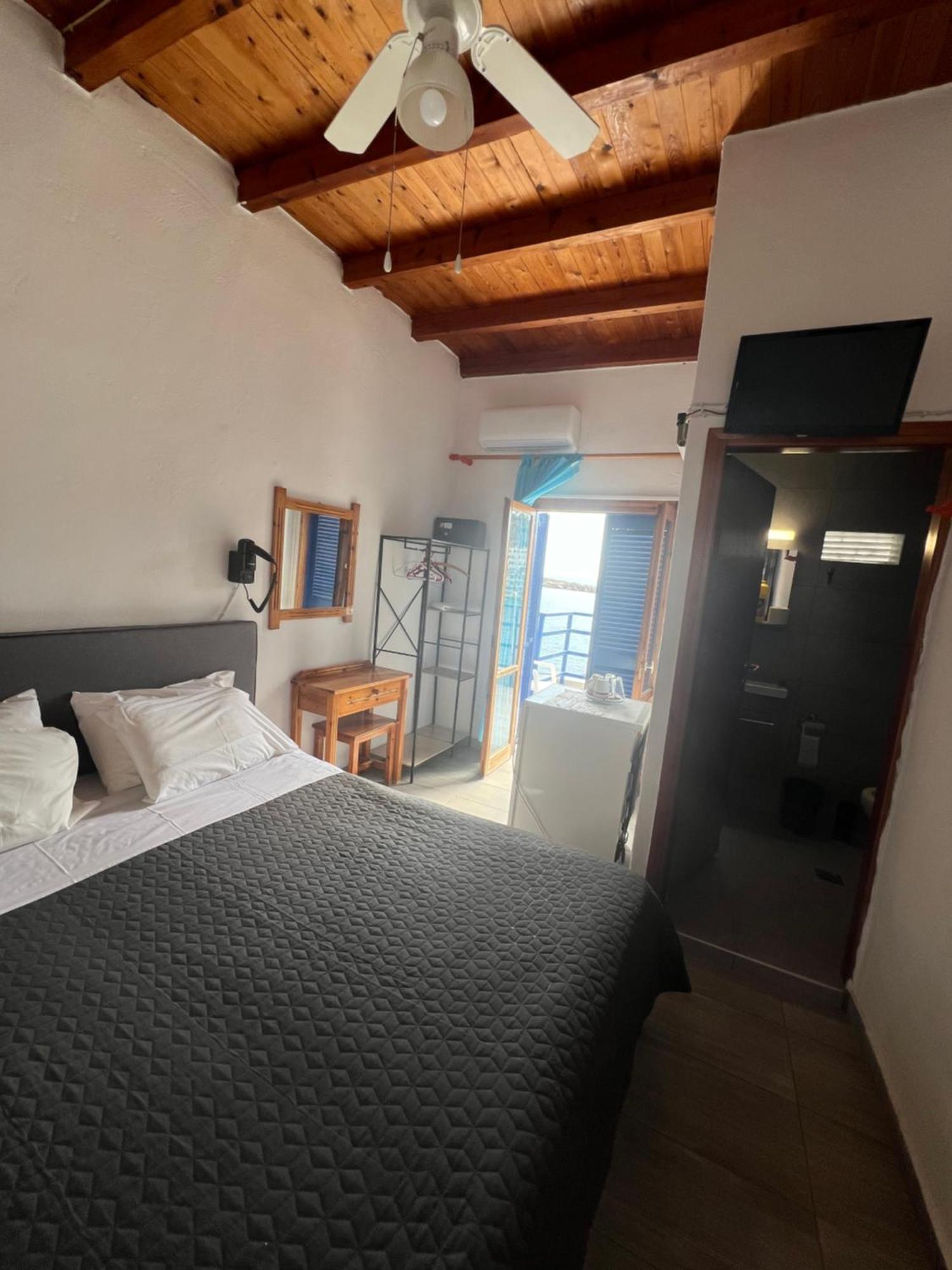 Scirocco Rooms Loutro Bagian luar foto