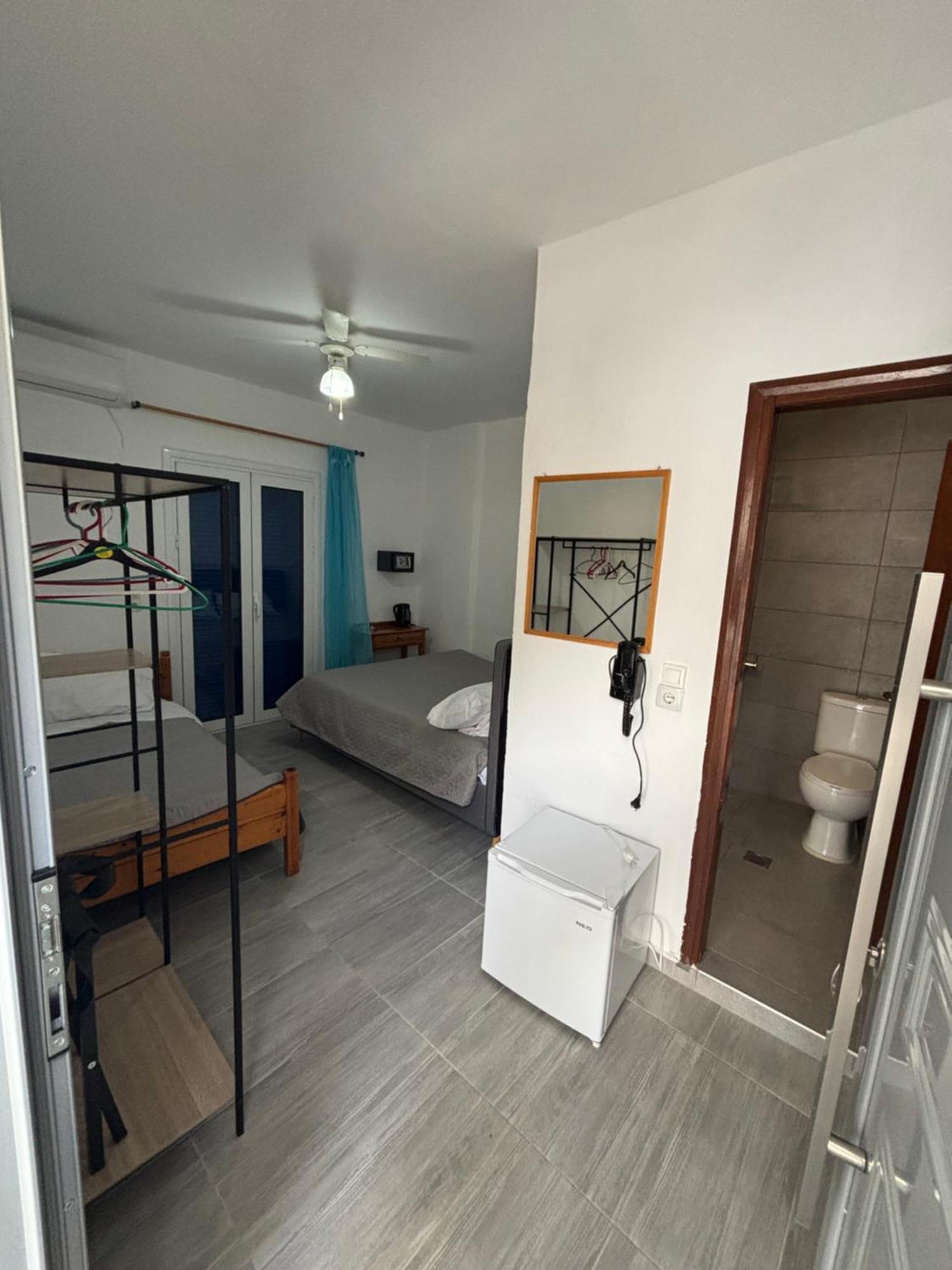 Scirocco Rooms Loutro Bagian luar foto