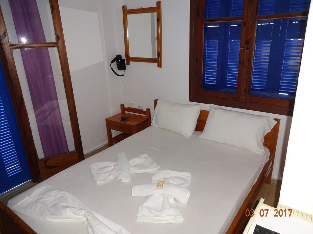 Scirocco Rooms Loutro Bagian luar foto